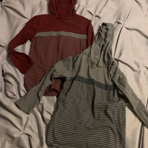 2 boys hooded long sleeve shirts